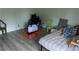 Bedroom with modern flooring and bright walls at 4814 Delgado Dr Sw, Lilburn, GA 30047
