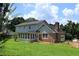 Charming home with a well-manicured lawn at 4814 Delgado Dr Sw, Lilburn, GA 30047