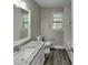 Bathroom featuring granite counters, a modern vanity, and lots of light at 650 Lake Forest Ct, Roswell, GA 30076