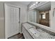 Bathroom featuring granite counters, a modern vanity, and lots of light at 650 Lake Forest Ct, Roswell, GA 30076