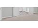 The spacious main bedroom leads into the luxurious bath with a tub at 7000 Foxberry Ln, Roswell, GA 30075