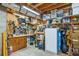 Functional basement workshop equipped with workbench, shelving, and tool storage at 120 Timbervalley Ln, Lawrenceville, GA 30043