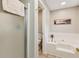 Bathroom with a tiled floor, a shower with a glass door and a separate soaking tub at 120 Timbervalley Ln, Lawrenceville, GA 30043