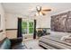 Bedroom with neutral colors, with a large window offering a green view at 120 Timbervalley Ln, Lawrenceville, GA 30043