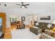 Bright and spacious living room featuring hardwood floors and dining room view at 120 Timbervalley Ln, Lawrenceville, GA 30043