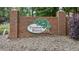 Timber Ridge community sign surrounded by a brick wall and mature trees at 120 Timbervalley Ln, Lawrenceville, GA 30043