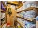 Organized storage room with multiple shelves and clear plastic containers for convenient storage at 120 Timbervalley Ln, Lawrenceville, GA 30043