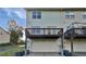 Exterior view showcasing a deck overlooking the backyard and garage at 2438 Suwanee Pointe Dr, Lawrenceville, GA 30043