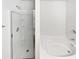 Bright bathroom featuring a glass door shower, a separate tub, and neutral color scheme at 2438 Suwanee Pointe Dr, Lawrenceville, GA 30043