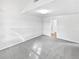 Bright, carpeted bedroom with white walls, perfect for creating a relaxing and personalized space at 2438 Suwanee Pointe Dr, Lawrenceville, GA 30043