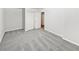 Empty bedroom with plush carpeting, neutral walls, and closet space ready for personalization at 2438 Suwanee Pointe Dr, Lawrenceville, GA 30043