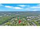Wide aerial shot highlighting a home's location within a densely wooded residential area at 3278 Shakerley Park, Douglasville, GA 30135