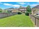 Backyard featuring green grass and a wood fence at 3278 Shakerley Park, Douglasville, GA 30135