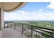 Spacious balcony with black railings offering expansive views of the surrounding landscape at 3445 Stratford Ne Rd # 3403, Atlanta, GA 30326