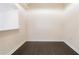 Empty room with hardwood floors and white walls at 3445 Stratford Ne Rd # 3403, Atlanta, GA 30326