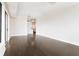 Open-concept living area featuring beautiful hardwood floors and modern lighting fixtures at 3445 Stratford Ne Rd # 3403, Atlanta, GA 30326