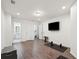 Spacious basement area with laminate flooring, recessed lighting and a TV area, perfect for entertainment at 350 Eagle Tiff Dr, Sugar Hill, GA 30518