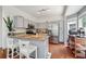 Modern kitchen with granite countertops, stainless steel appliances, and a breakfast bar for casual dining at 350 Eagle Tiff Dr, Sugar Hill, GA 30518
