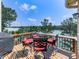 Outdoor deck with chairs and lake view at 7560 Island Mill Rd, Acworth, GA 30102