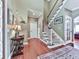 Elegant foyer with hardwood floors, staircase, and decorative accents at 7560 Island Mill Rd, Acworth, GA 30102
