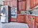 Gourmet kitchen features stainless steel appliances, including a double oven and refrigerator at 7560 Island Mill Rd, Acworth, GA 30102