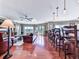 Spacious living room with hardwood floors, fireplace, and large windows with view at 7560 Island Mill Rd, Acworth, GA 30102