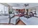 Open living room with hardwood floors and seamless flow into the kitchen at 7560 Island Mill Rd, Acworth, GA 30102