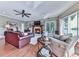 Inviting living room with a fireplace, ample seating, and a view of the lake at 7560 Island Mill Rd, Acworth, GA 30102