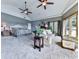 Large main bedroom with vaulted ceiling, ceiling fans, and an adjoining sitting area at 7560 Island Mill Rd, Acworth, GA 30102