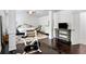 Spacious bedroom including a workout area with an exercise bike and free weights at 1982 Brightleaf Way, Marietta, GA 30060