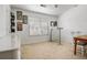 Sunlit bedroom with neutral décor, modern desk and chair, and ample natural light at 1982 Brightleaf Way, Marietta, GA 30060