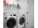 Convenient laundry room featuring modern washer and dryer units for efficient laundry care at 1982 Brightleaf Way, Marietta, GA 30060