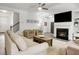 Inviting living room with a cozy fireplace, plush seating, and an open layout at 1982 Brightleaf Way, Marietta, GA 30060