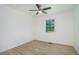 A naturally lit bedroom features modern vinyl plank flooring, and a ceiling fan at 2005 Simmons Ave, Atlanta, GA 30337