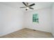 A naturally lit bedroom features modern vinyl plank flooring, and a ceiling fan at 2005 Simmons Ave, Atlanta, GA 30337