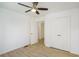 This bedroom has modern vinyl plank flooring, a ceiling fan and a closet at 2005 Simmons Ave, Atlanta, GA 30337