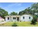 Charming single-story home featuring a brick facade and a well-maintained lawn at 2005 Simmons Ave, Atlanta, GA 30337