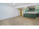 Open floor plan showcasing the new flooring and stylish kitchen updates at 2005 Simmons Ave, Atlanta, GA 30337