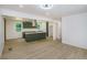 Open-concept layout with new floors connecting kitchen and dining areas, great for entertaining at 2005 Simmons Ave, Atlanta, GA 30337
