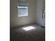 An empty bedroom with neutral walls and floors, and two windows at 2842 Jordan Forest Trail Northwest, Lawrenceville, GA 30044