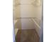 Interior shot of walk-in closet that has wall shelving and clothing rods at 2842 Jordan Forest Trail Northwest, Lawrenceville, GA 30044