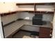 An office space with a built in desk, drawers and shelving at 2842 Jordan Forest Trail Northwest, Lawrenceville, GA 30044