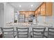 Charming kitchen with granite countertops, stainless steel appliances, and breakfast bar seating at 31 Country Place Ct, Alpharetta, GA 30005