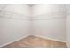 Walk-in closet featuring carpeted floor and white wire shelving at 111 Point View Dr, Canton, GA 30114