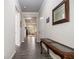 Inviting hallway featuring hardwood floors, neutral walls, and a view into the living area at 111 Point View Dr, Canton, GA 30114