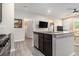 Beautiful kitchen with a center island, stainless appliances, and an open layout at 111 Point View Dr, Canton, GA 30114