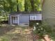 Backyard building featuring white trim and garden at 2832 Jordan Forest Trail Northwest, Lawrenceville, GA 30044