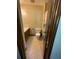 Modest bathroom with toilet, sink, cabinet and shower behind curtain at 2832 Jordan Forest Trail Northwest, Lawrenceville, GA 30044