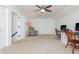 Large bonus room with two desk areas, a cozy chair and carpeted floors, perfect for versatile use at 3375 Rivendell Ct, Roswell, GA 30075