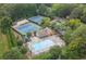 Aerial view of community amenities: pool, tennis courts, playground, and clubhouse at 3375 Rivendell Ct, Roswell, GA 30075